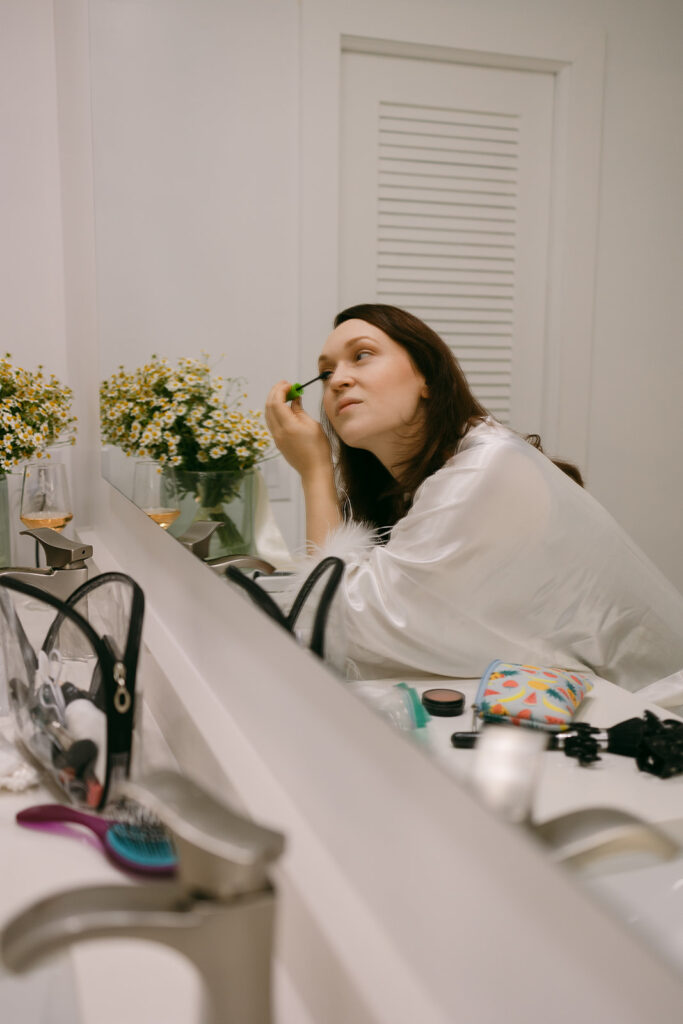 Bride touching up make up for backyard elopement

Destination Elopement Photographer