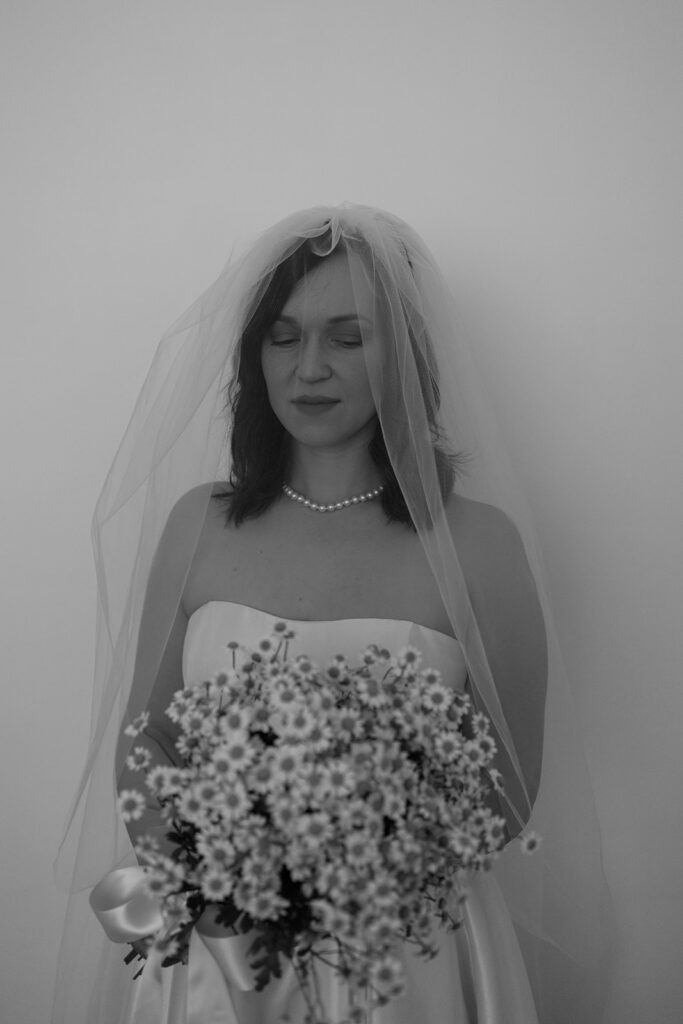 Black and White Bridal portraits with veil and bouquet pearl necklace

Miami Destination Elopement Photographer