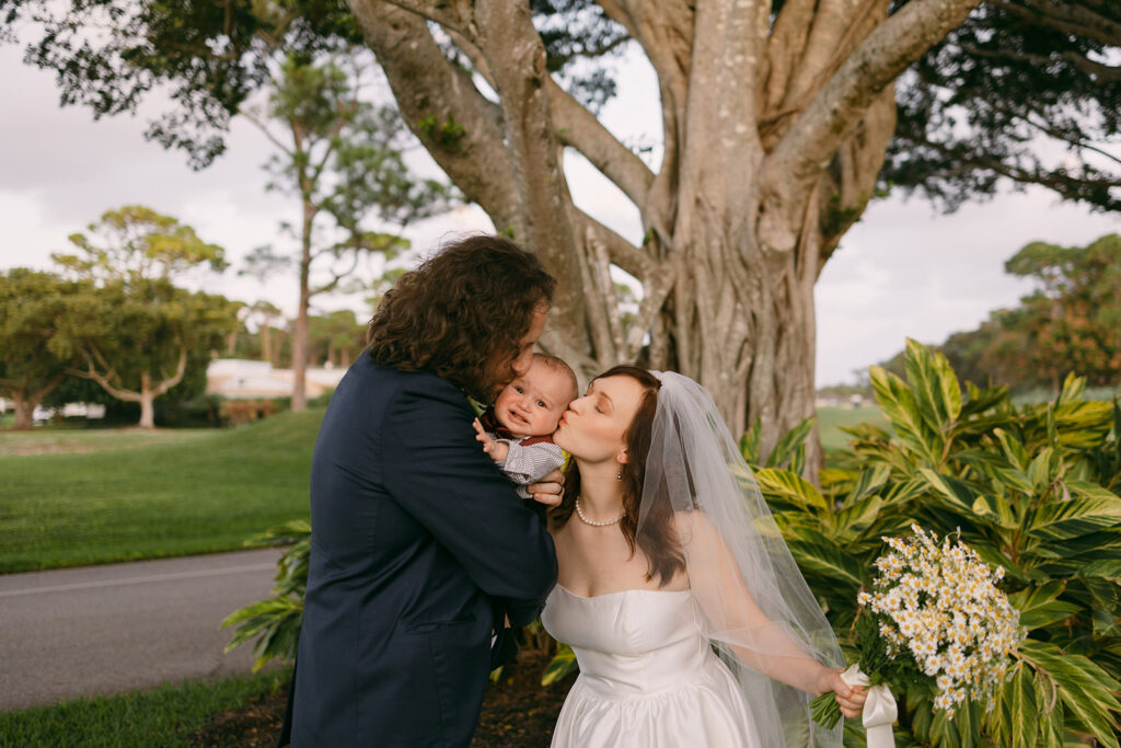 Bride and Groom Family Candid Kissing Baby

Miami Destination Elopement Photographer