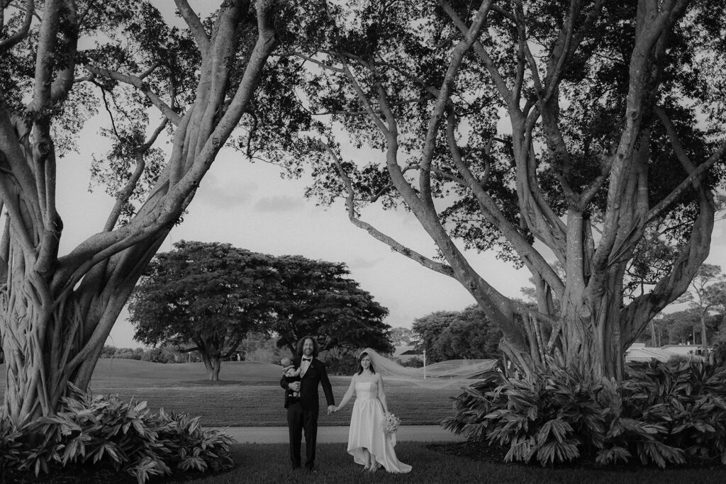 Bride and Groom Family Portrait between trees

Miami Destination Elopement Photographer