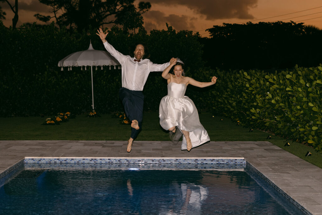 Bride and Groom Jumping into Pool After Party

Miami Destination Elopement Photographer