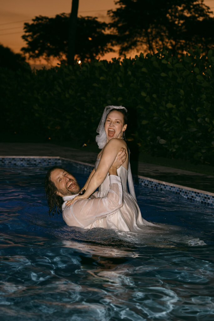 Bride and Groom in Pool sunset After Elopement

Miami Destination Elopement Photographer