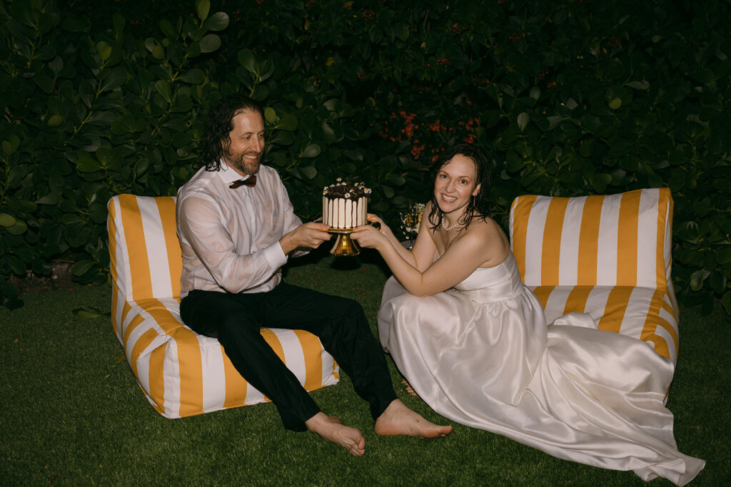 Wet Bride and Groom Posing with Wedding Cake

Miami Destination Elopement Photographer