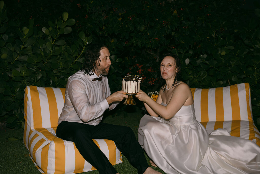 Wet Bride and Groom Posing with Wedding Cake

Miami Destination Elopement Photographer