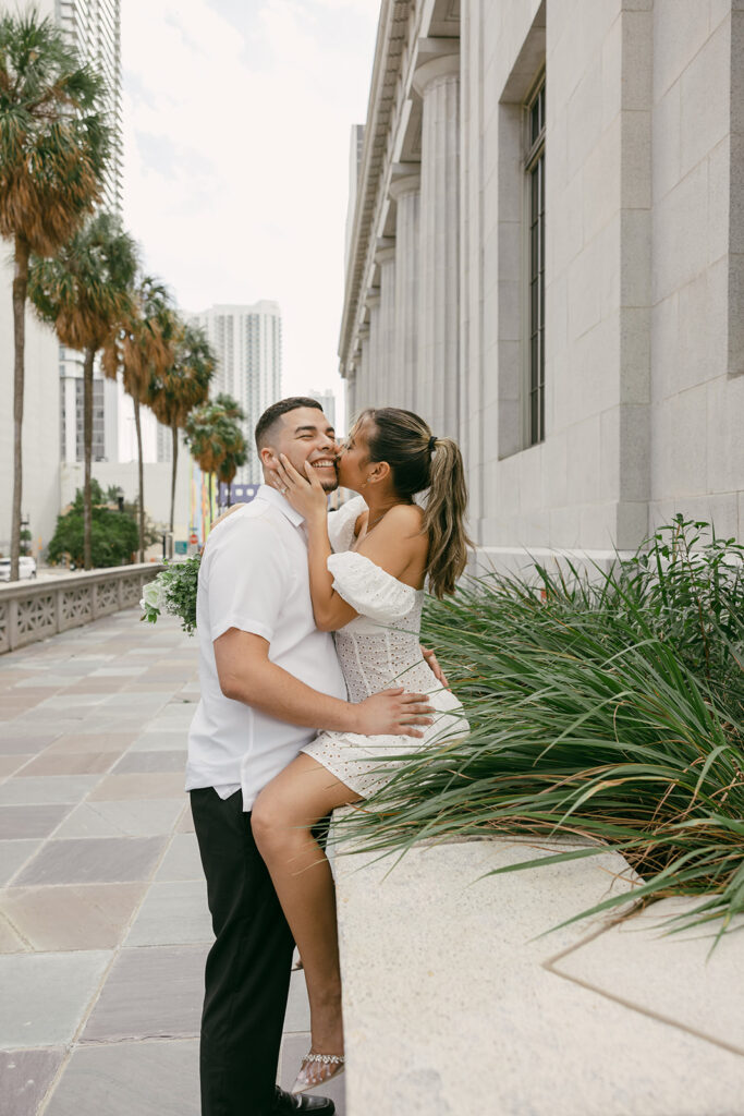 smiling and kissing courthouse elopement pictures 

miami destination wedding and elopement photographers