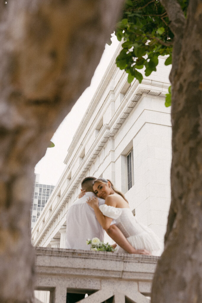 smiling and kissing courthouse elopement pictures 

miami destination wedding and elopement photographers