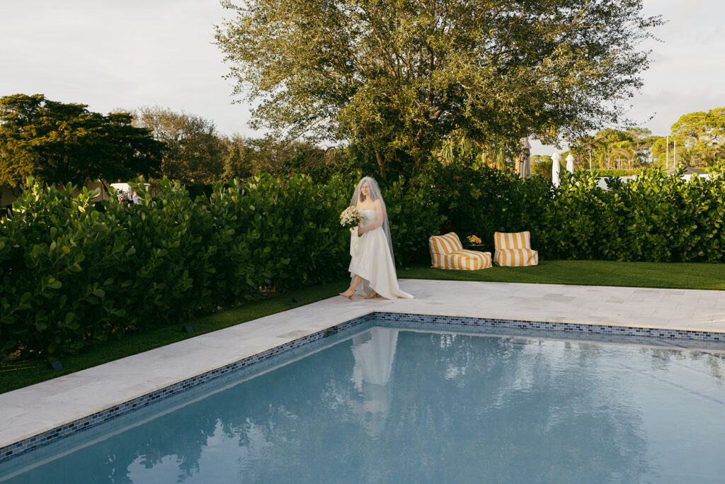 Bride Walking down aisle - Timeless Backyard Elopement Ceremony Area

Miami Destination Elopement Photographer