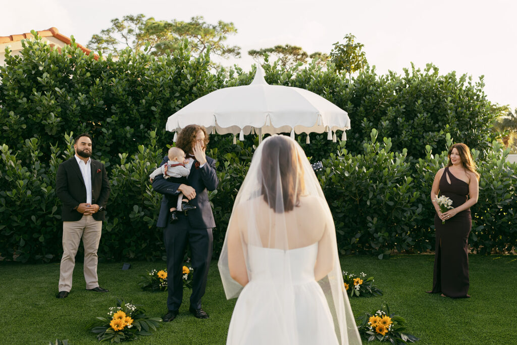 Bride Walking down aisle - Crying Groom Reaction Timeless Backyard Elopement Ceremony Area

Miami Destination Elopement Photographer