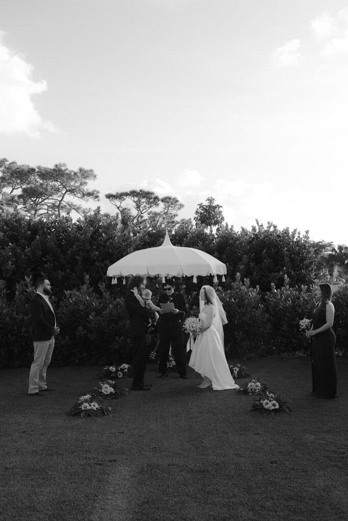 Black and White Groom and Bride exchanging vows

Miami Destination Elopement Photographer