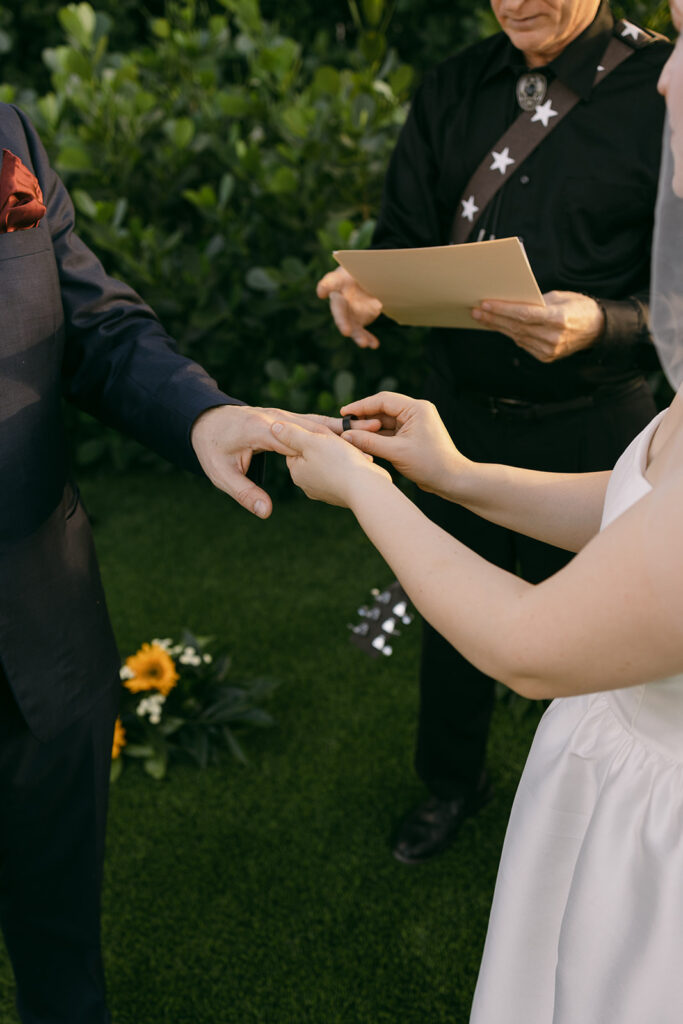 Bride and Groom exchanging wedding bands

Miami Destination Elopement Photographer