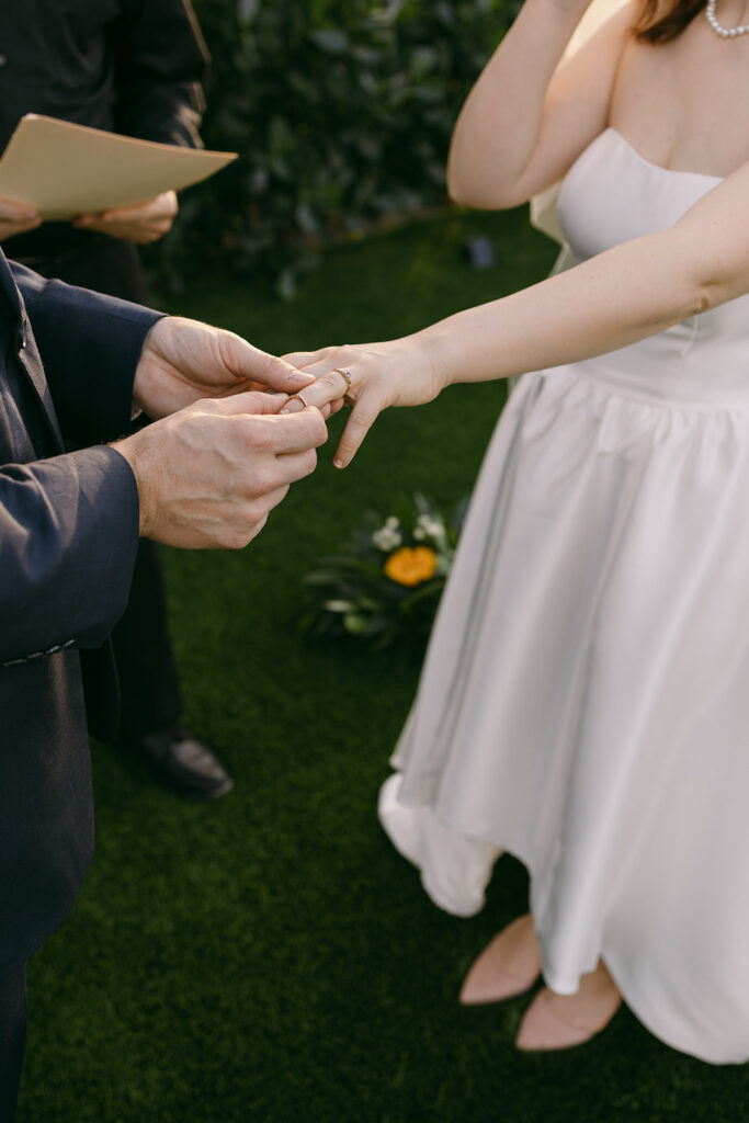 Bride and Groom exchanging wedding rings

Miami Destination Elopement Photographer