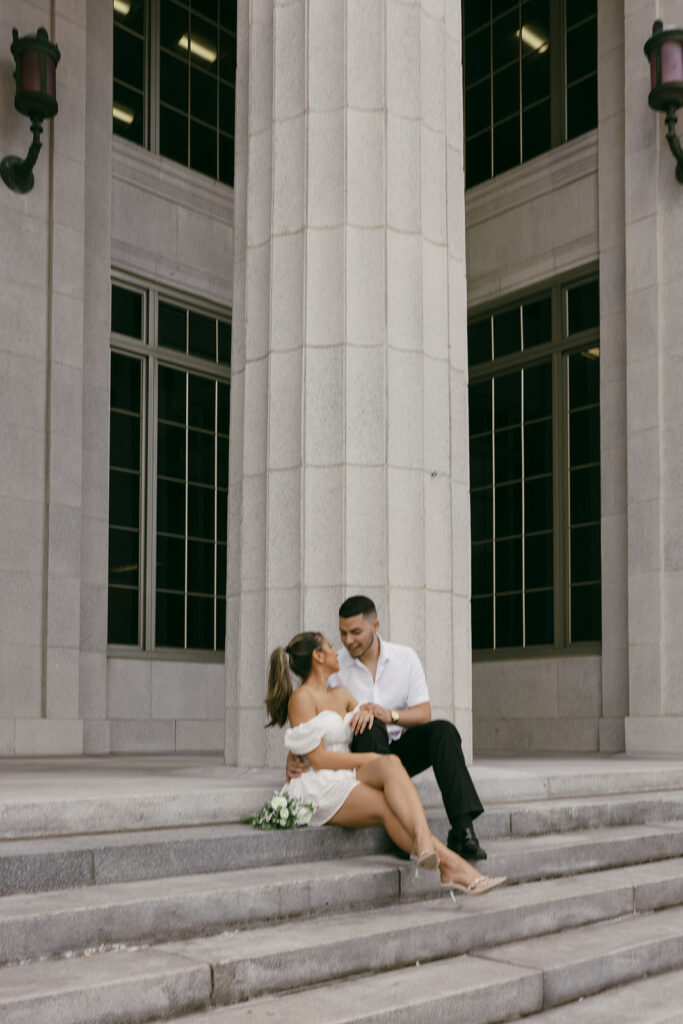 couple poses courthouse elopement photography 