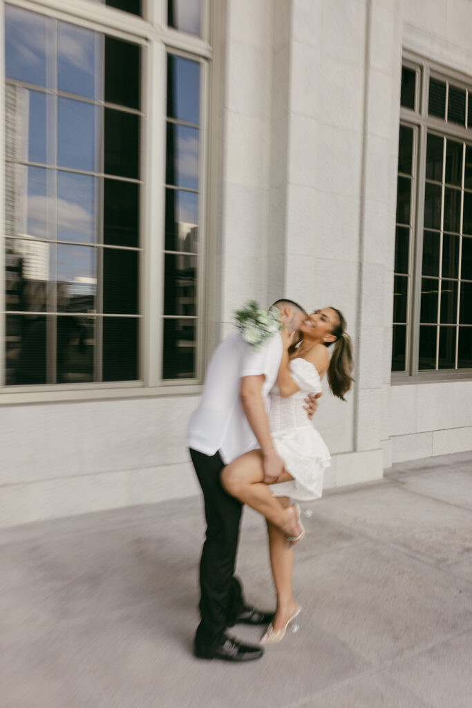 destination elopement photographer playful couple poses