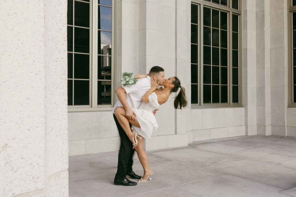 destination elopement photographer newly weds kissing