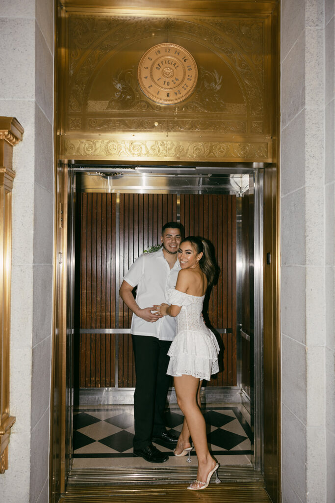 playful elevator courthouse wedding photos