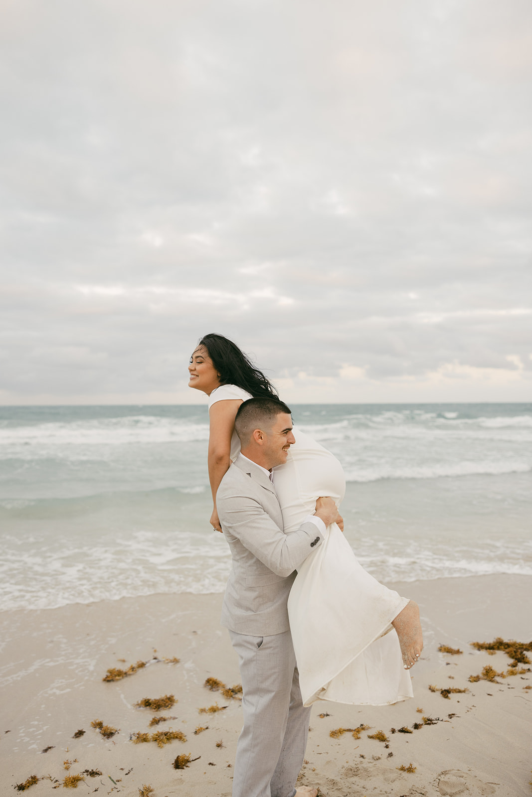 playful elopement beach pictures miami wedding photographer