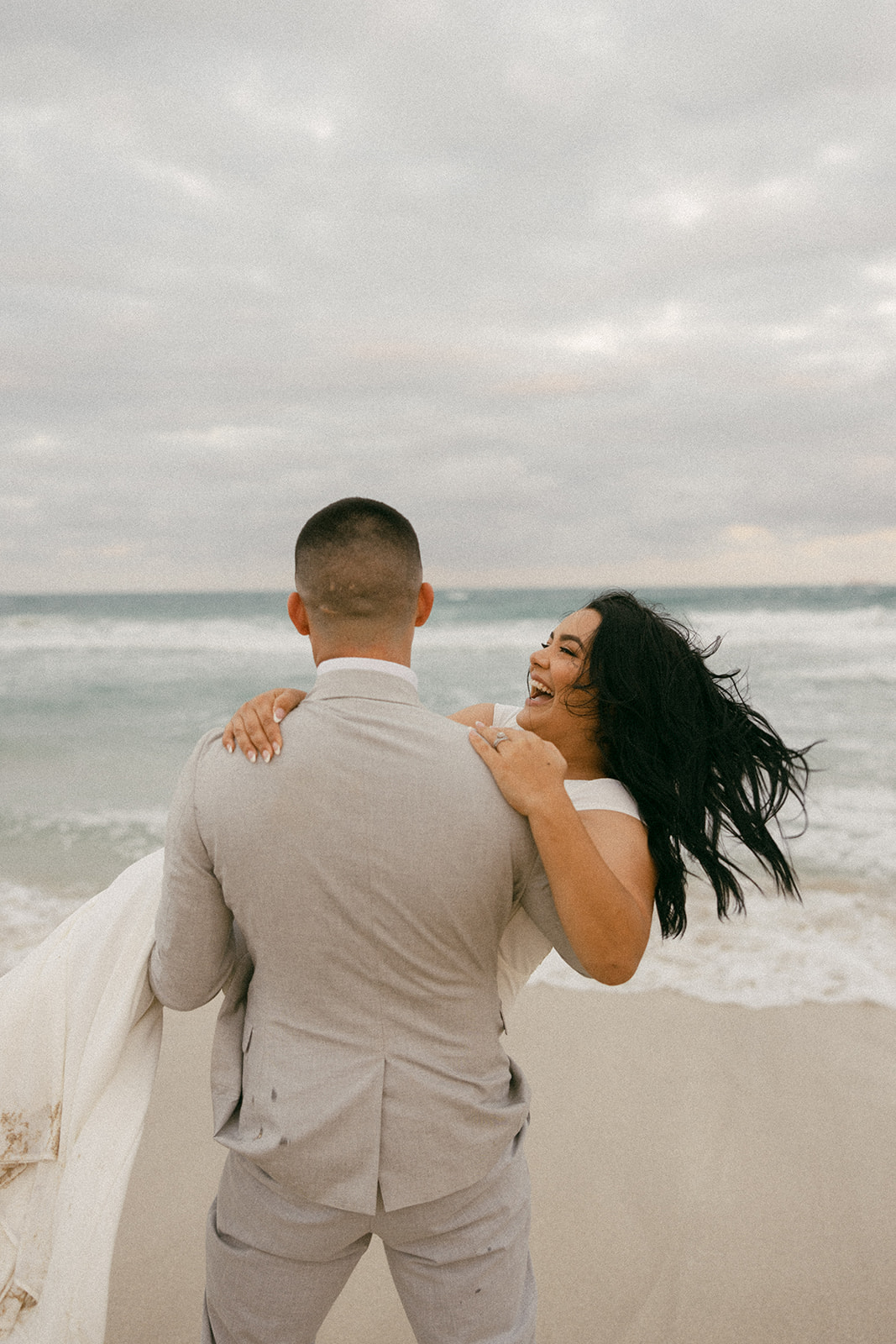 laughing elopement beach pictures miami wedding photographer