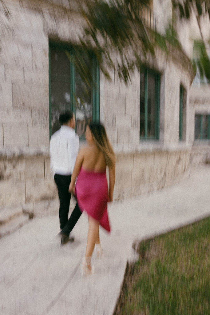 blurry romantic courthouse engagement session motion walk walking couple miami elopement photographer