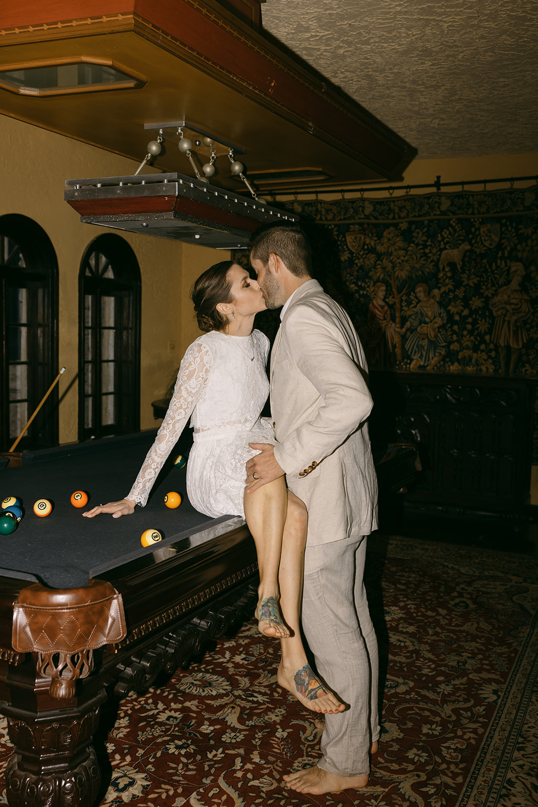 Elopement Pictures Spain Wedding Photographer pool table bride and groom pictures