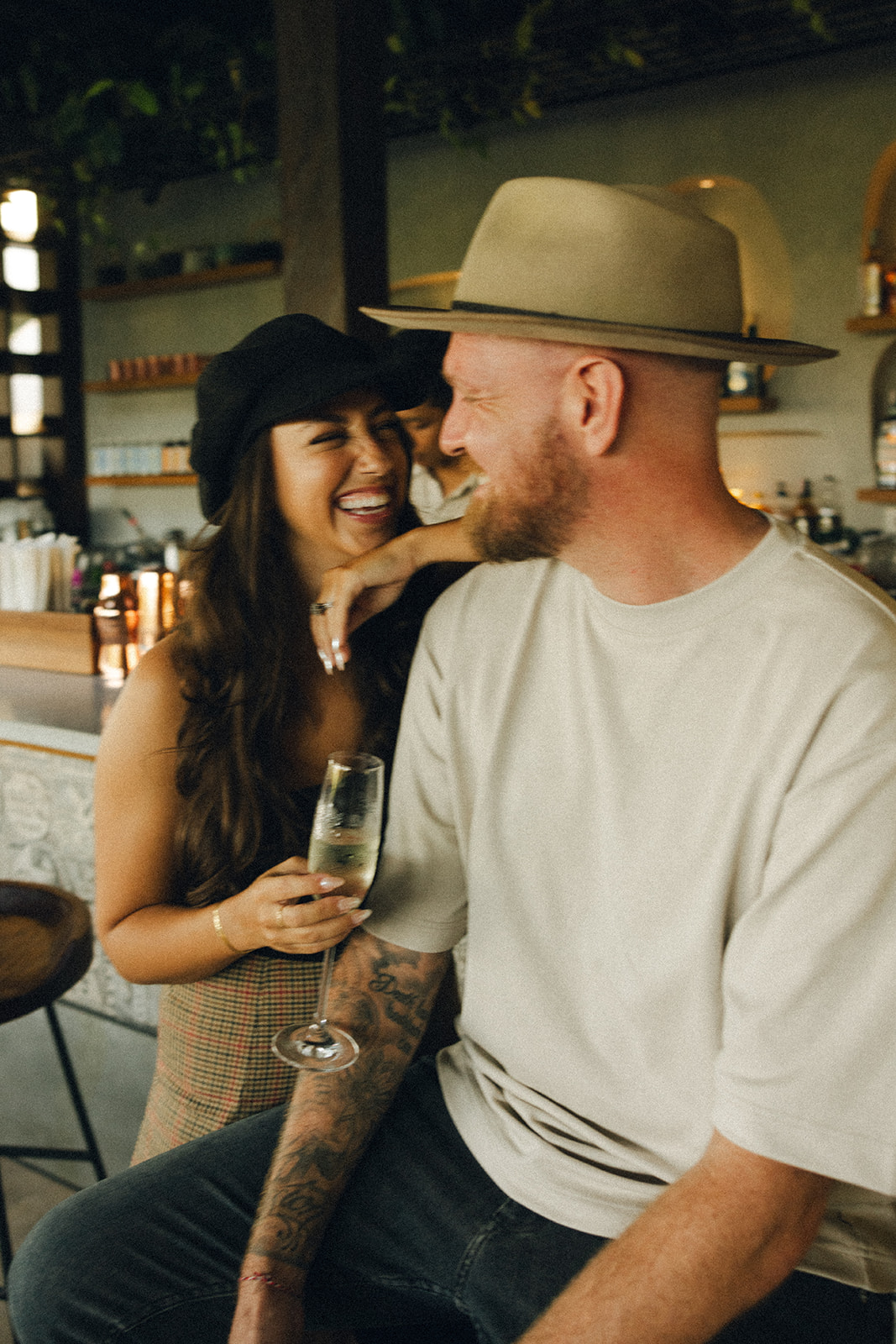 bali engagement session in bar smiling couple