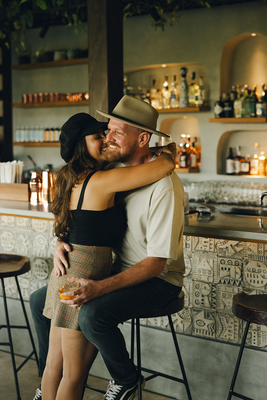 bali engagement session in bar smiling couple