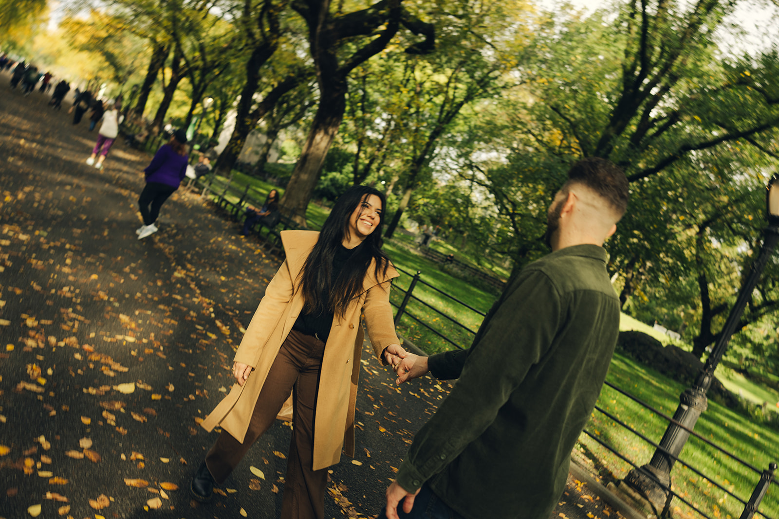 nyc central park fall couples session new york wedding photographer engagement session new york city wedding photographer motion blur