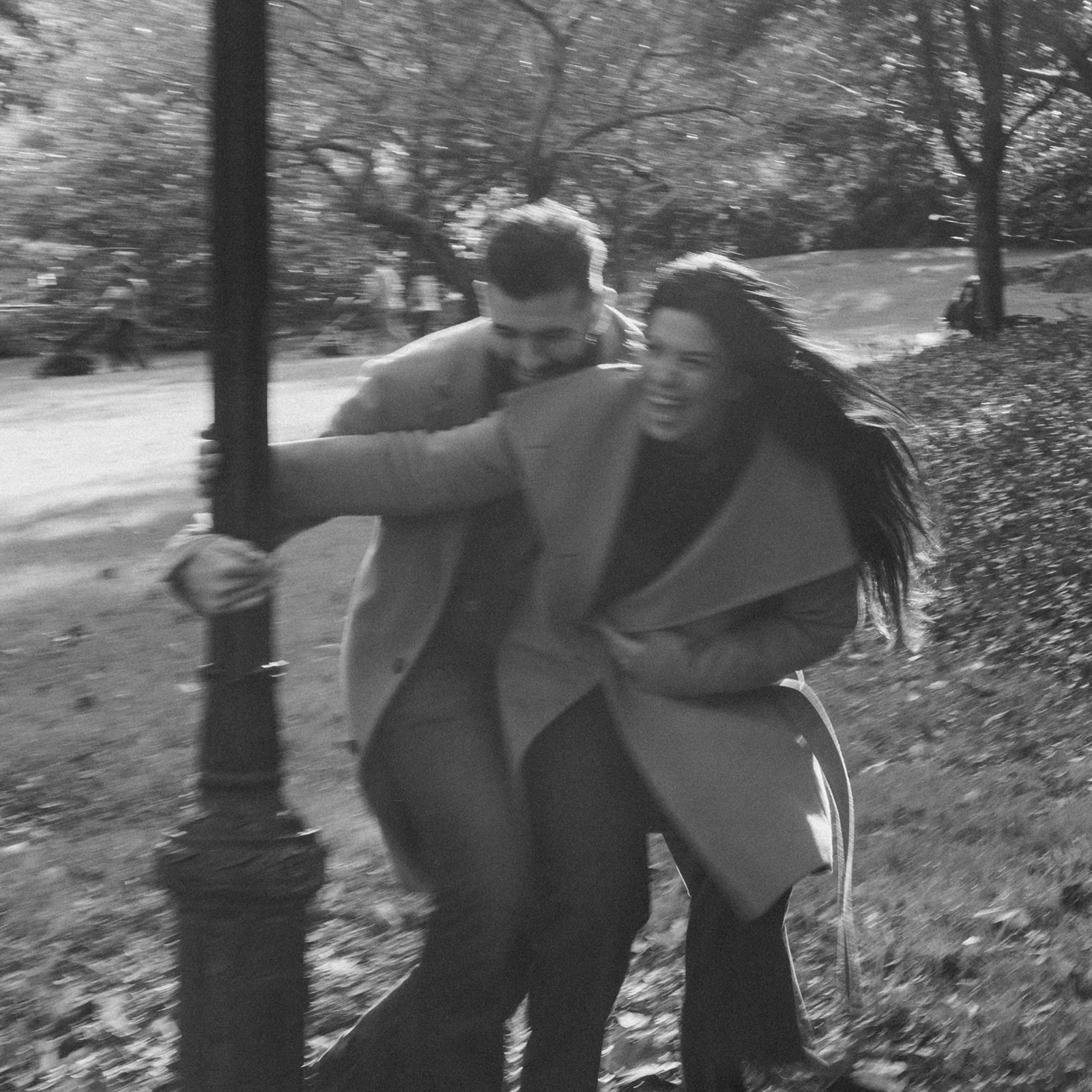 nyc central park fall couples session new york wedding photographer engagement session new york city wedding photographer running and laughing couple