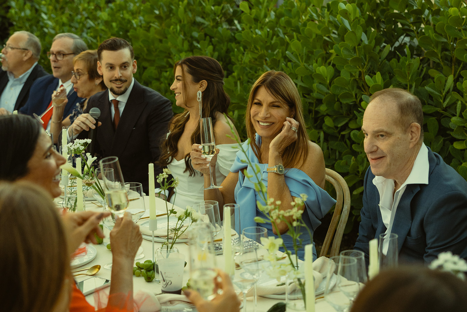 documentary guests reactions dinner and speeches dreamy and elevated intimate backyard wedding by Aileen Ayala Photography