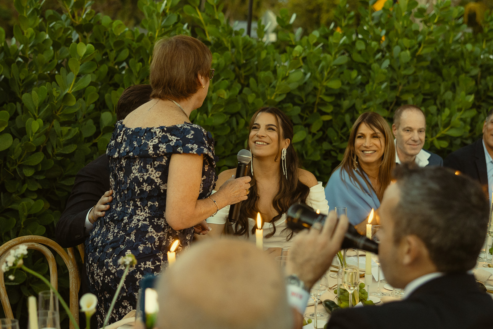 documentary bride reactions dinner and speeches dreamy and elevated intimate backyard wedding by Aileen Ayala Photography