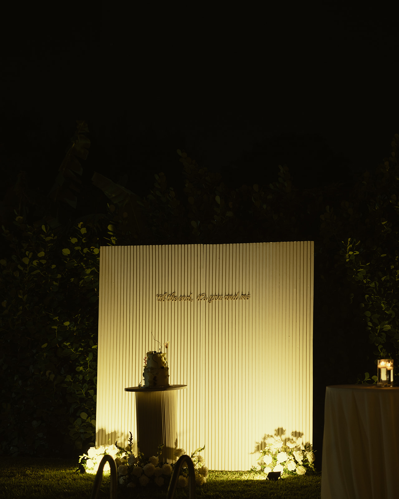 cake stance and backdrop dreamy and elevated intimate backyard wedding by Aileen Ayala Photography 