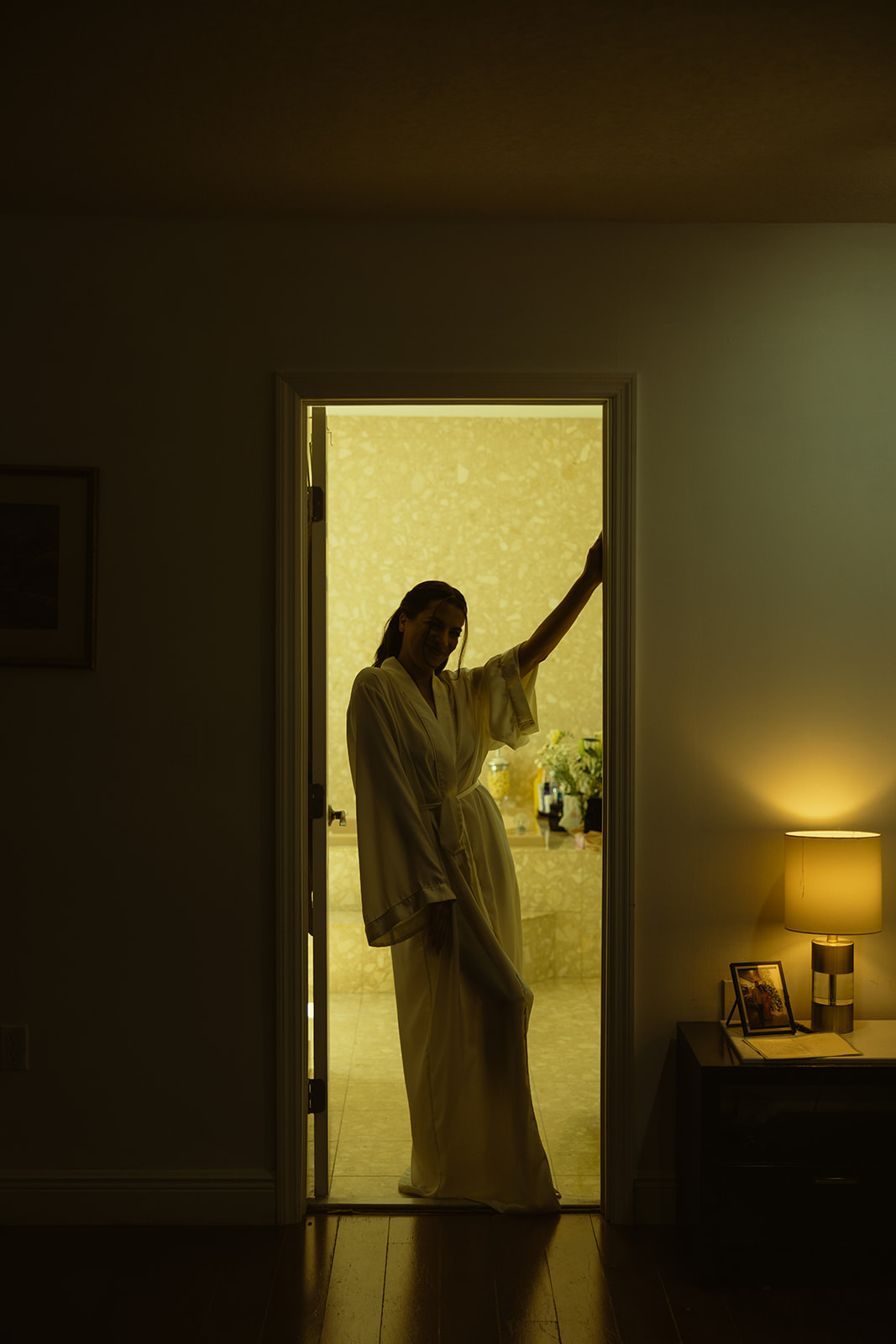 Documentary Bride Getting Ready in Robe Silhouette dreamy and elevated intimate backyard wedding by Aileen Ayala Photography