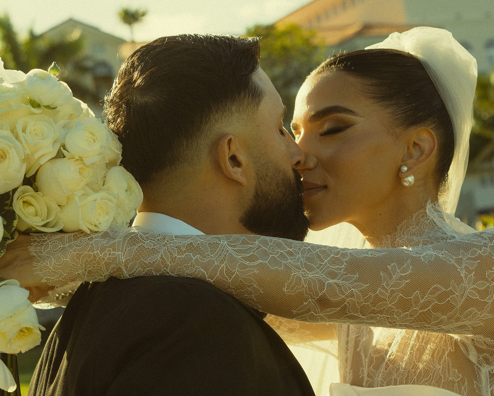 Kissing Newly Wed Portraits in JW Marriott Turnberry in Miami Florida. Documentary Wedding Photographer