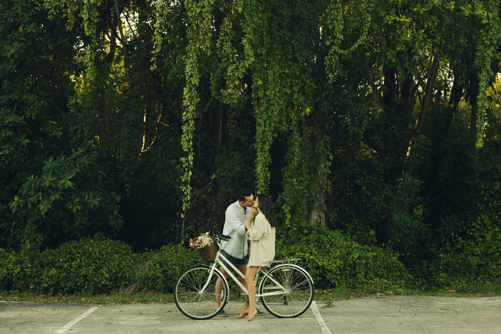 Horizontal Romantic Biking Couples Engagement Session In Miami Beach