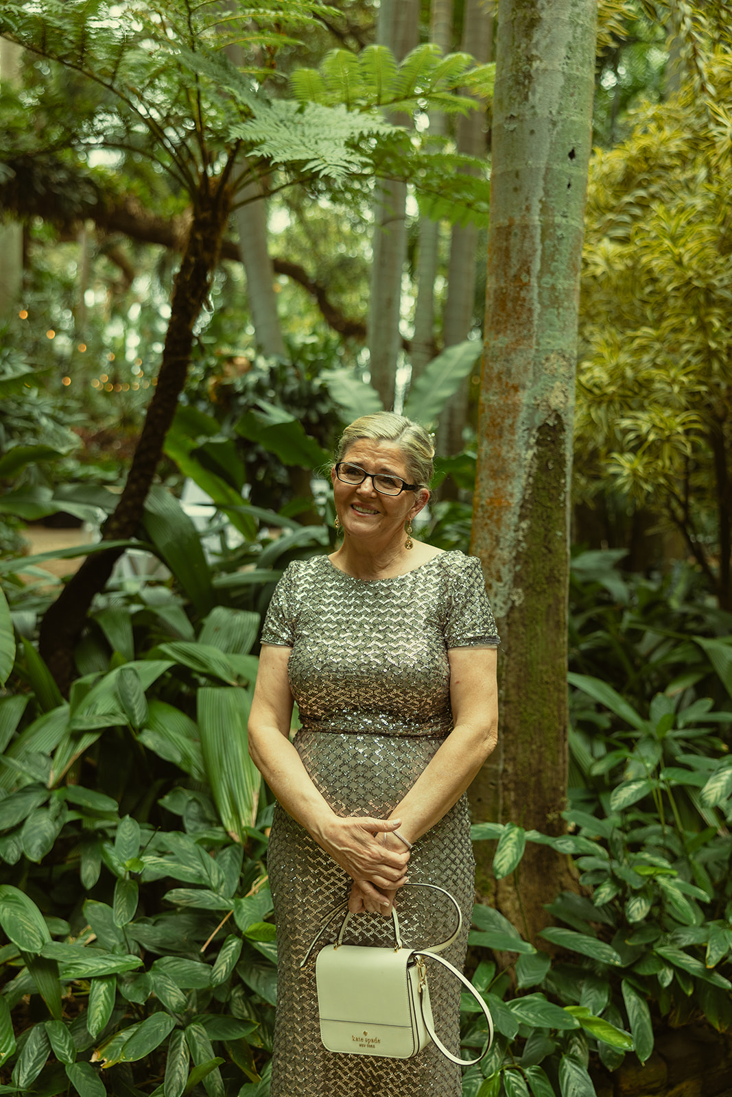 Mothers reaction during the daughter & Father First Look for Wedding in Sunken Gardens in St.Petersburg.