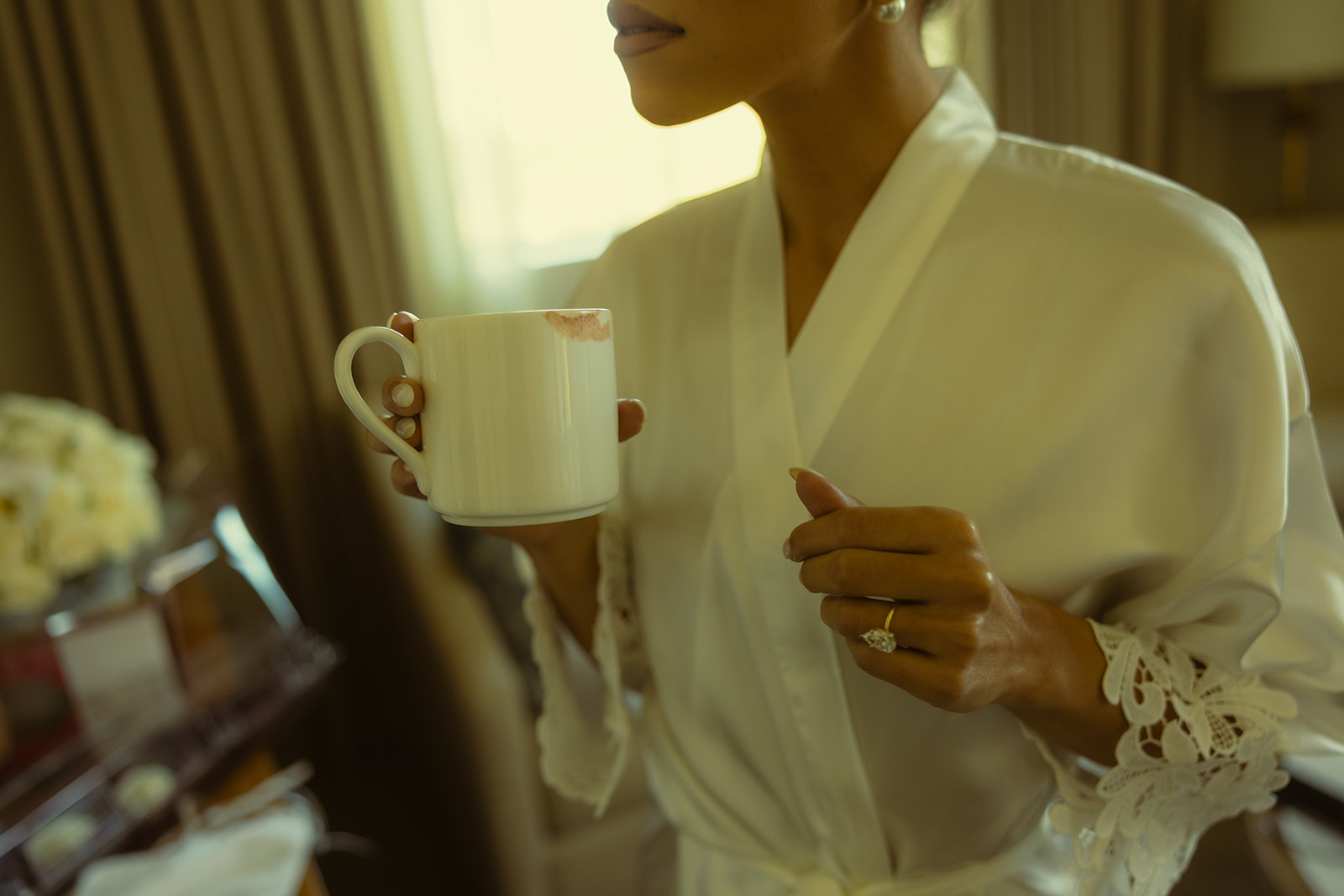 Brides Stained Lipstick on Coffee Mug with Diamond Engagement Ring in White Bride Robe at JW Miami Turnberry Resort & Spa in Aventura, Florida