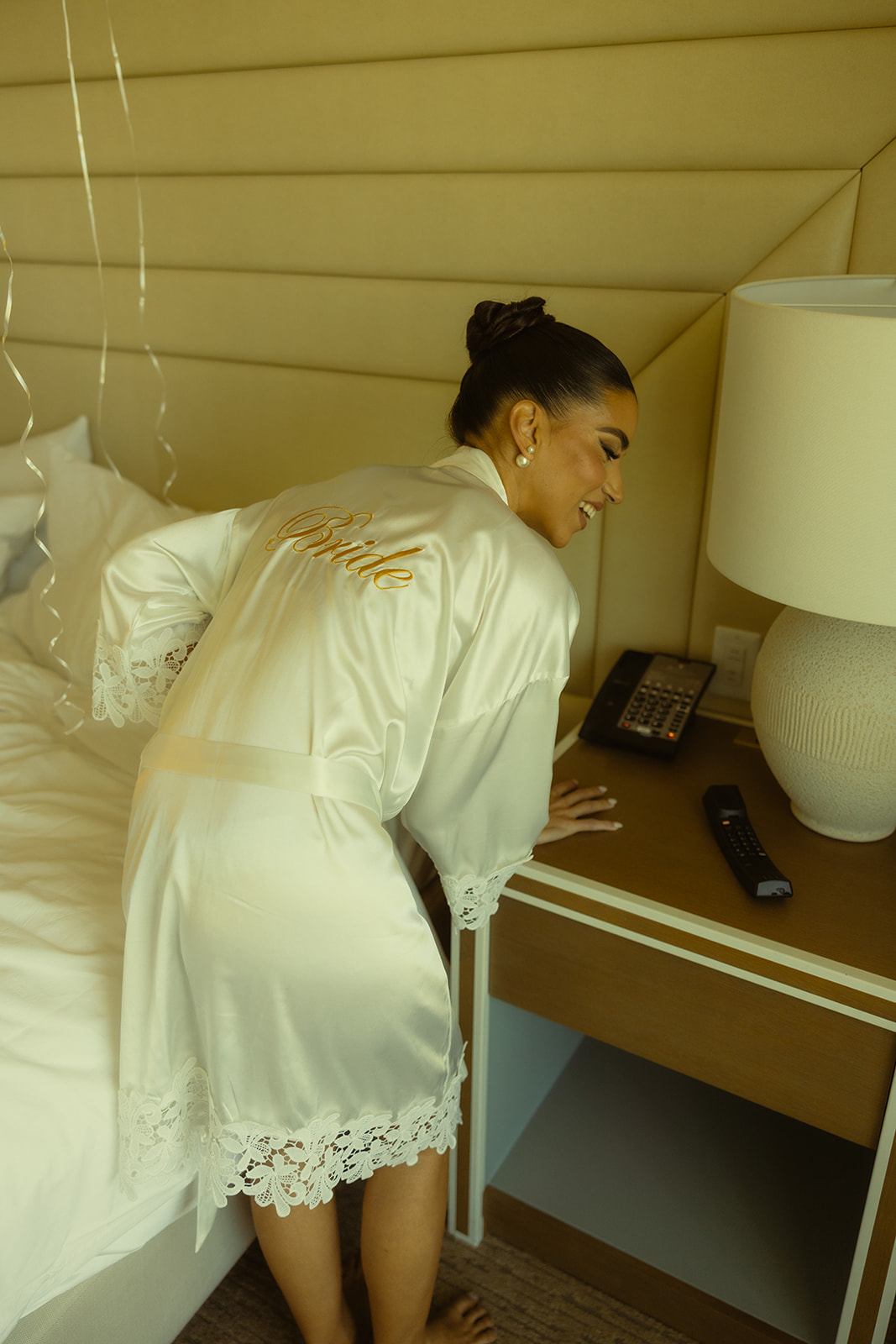 Bride Candid While On the Hotel Room Phone JW Miami Turnberry Resort & Spa in Aventura, Florida