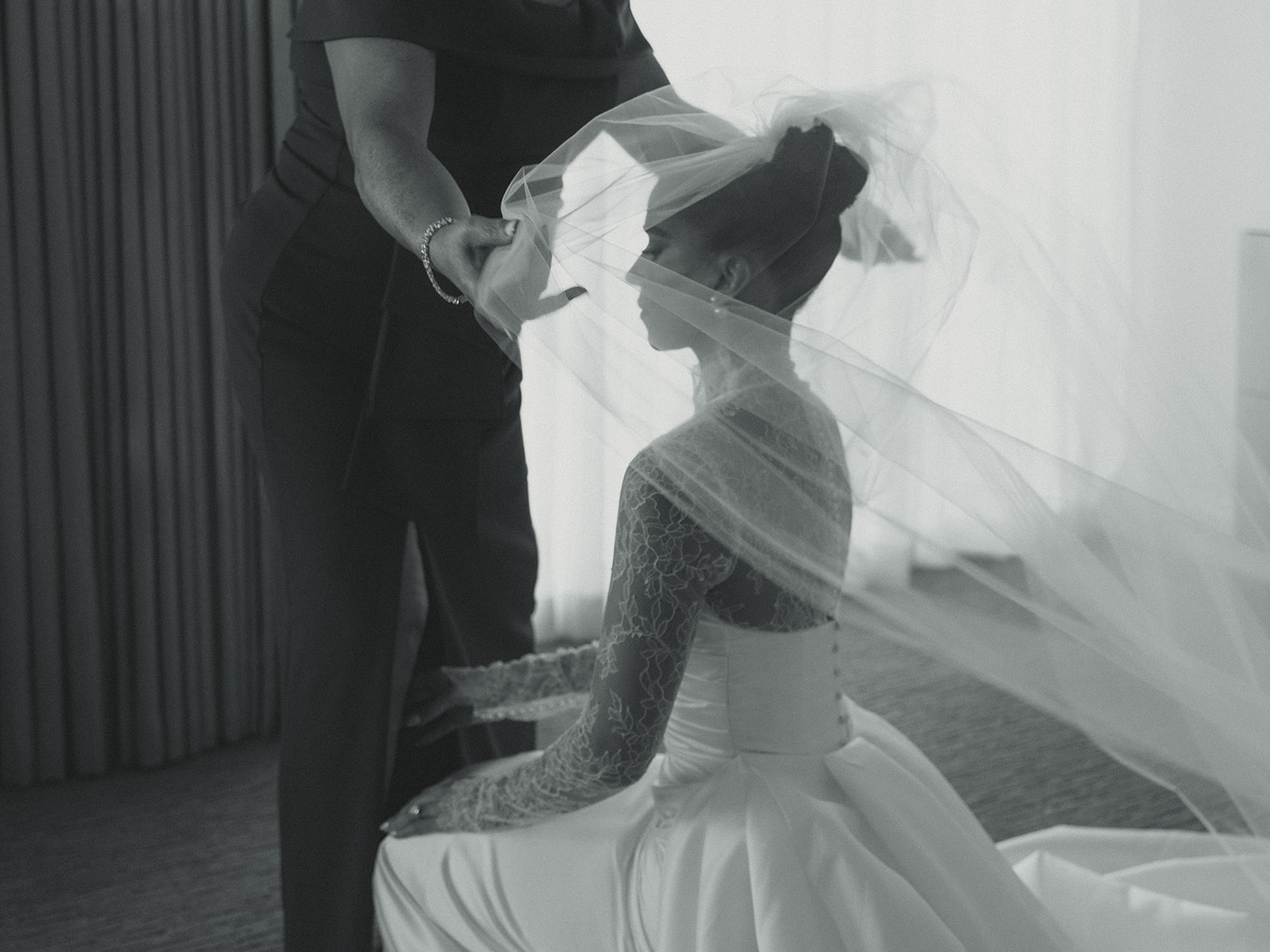 Mom fixing Brides Veil JW Miami Turnberry Resort & Spa in her Essense of Australia Wedding Dress in Black and White