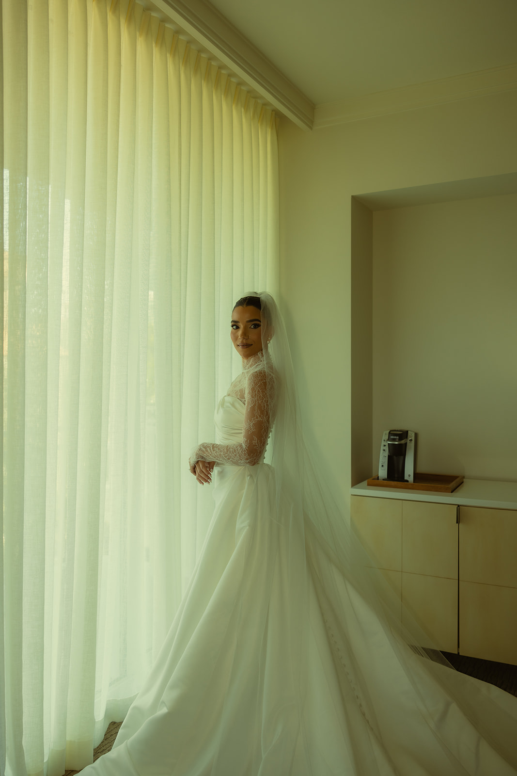 Solo Elegant Bridal Portraits in JW Turnberry Resort in Aventura Florida in Australia of Essense wedding dress with Mesh Turtle Neck