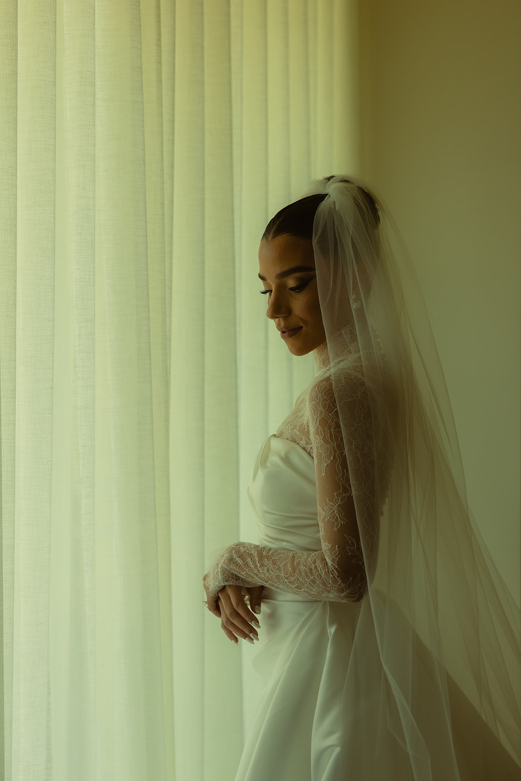 Luxurious and Elegant Close Up Bridal Portraits in Australia of Essense wedding dress with Mesh Turtle Neck at the JW Turnberry Resort in Aventura Florida in Black and White