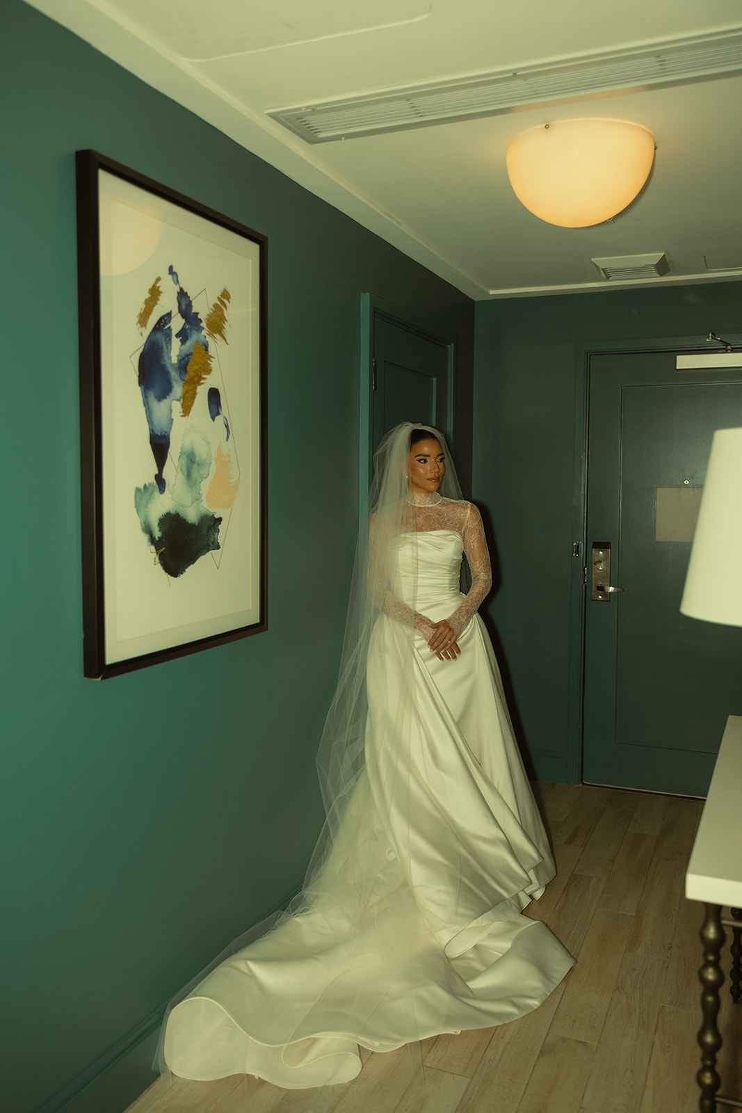 Eclectic Wedding Bridal Portraits in Australia of Essense wedding dress with Mesh Turtle Neck and Veil at the JW Turnberry Resort in Aventura Florida 