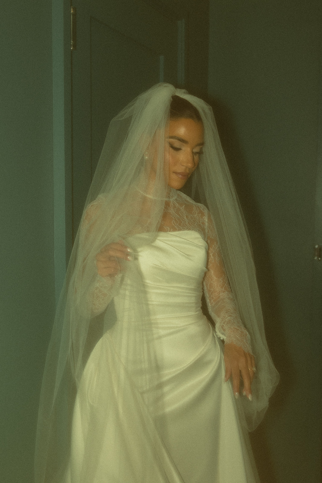 Eclectic Vintage Wedding Bridal Portraits in Australia of Essense wedding dress with Mesh Turtle Neck and Veil at the JW Turnberry Resort in Aventura Florida 