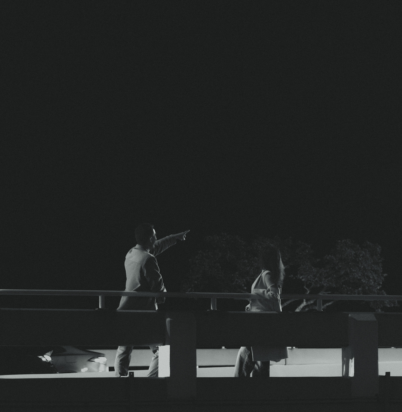 B&W Pointing Candid City Night Couples Engagement Session In Brickell Miami 