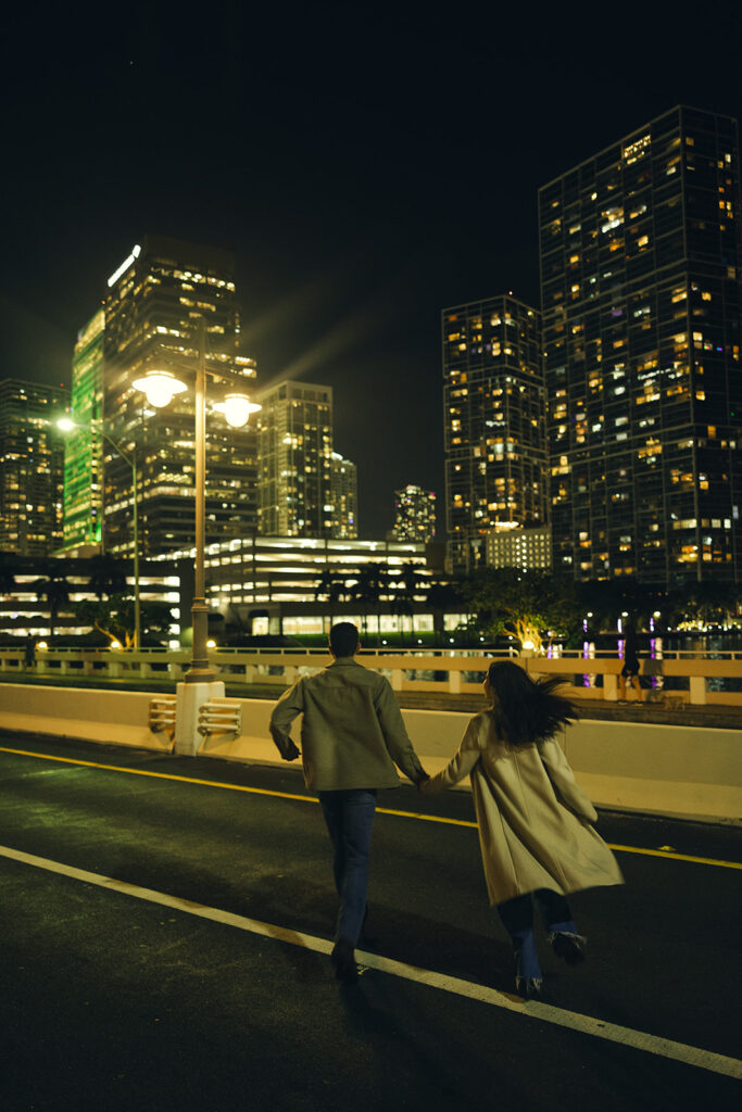 Documentary City Lights at Night Running Couple Engagement Session In Brickell Miami 