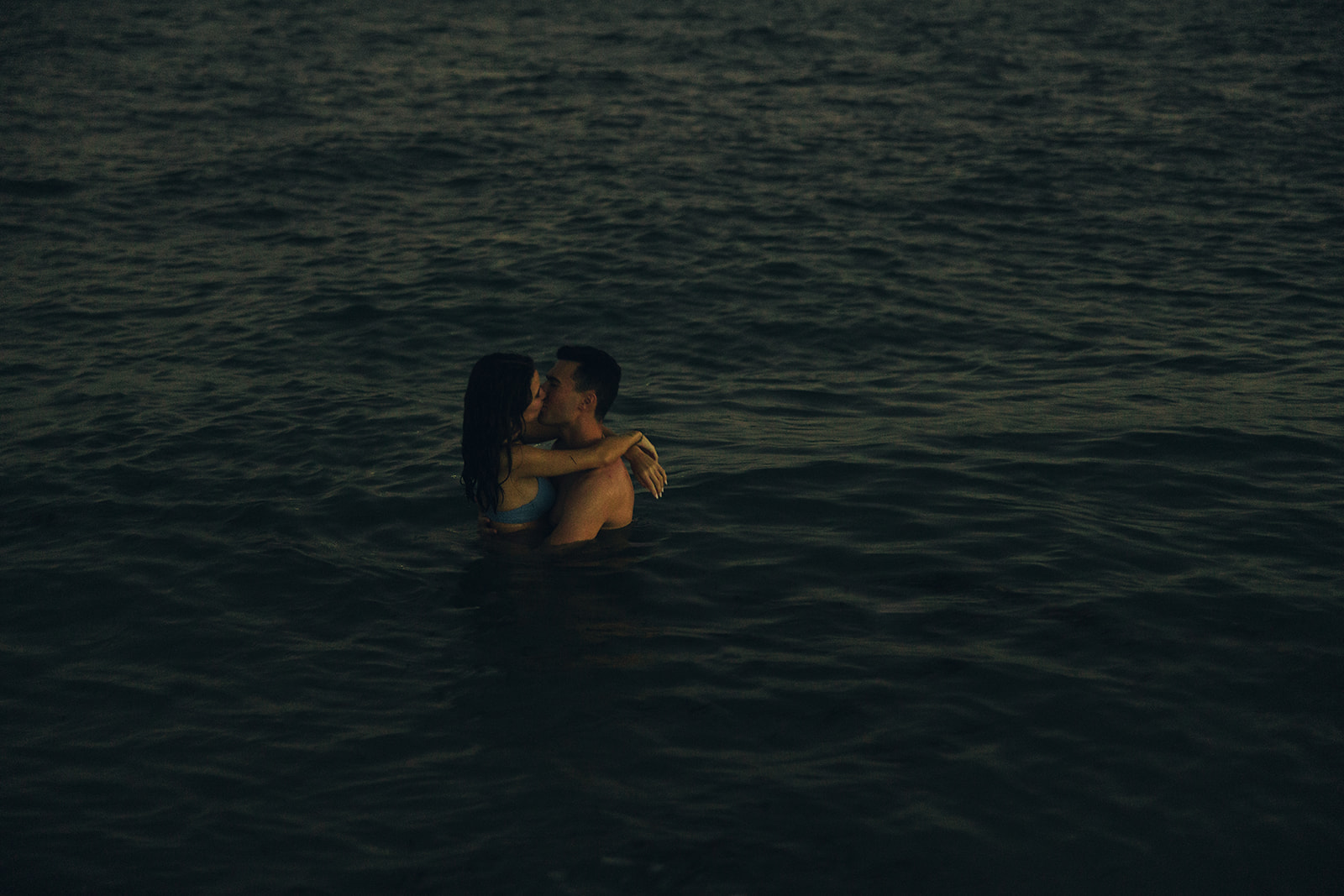 Candid Kissing in Water Couples Engagement Session In Miami Beach 