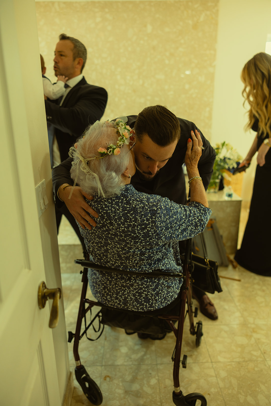 Documenting Moments Before Ceremony Groom hugging grandmother dreamy and elevated intimate backyard wedding by Aileen Ayala Photography