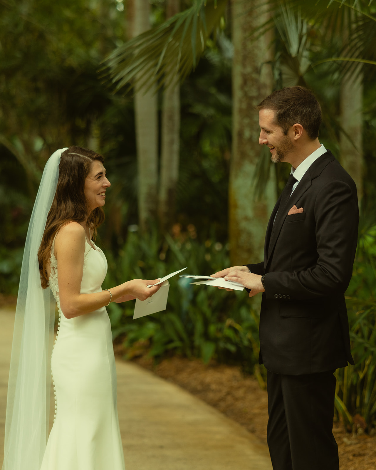 Smiling and Laughing bride and groom during Personal Vow Exchange at Sunken Gardens Wedding