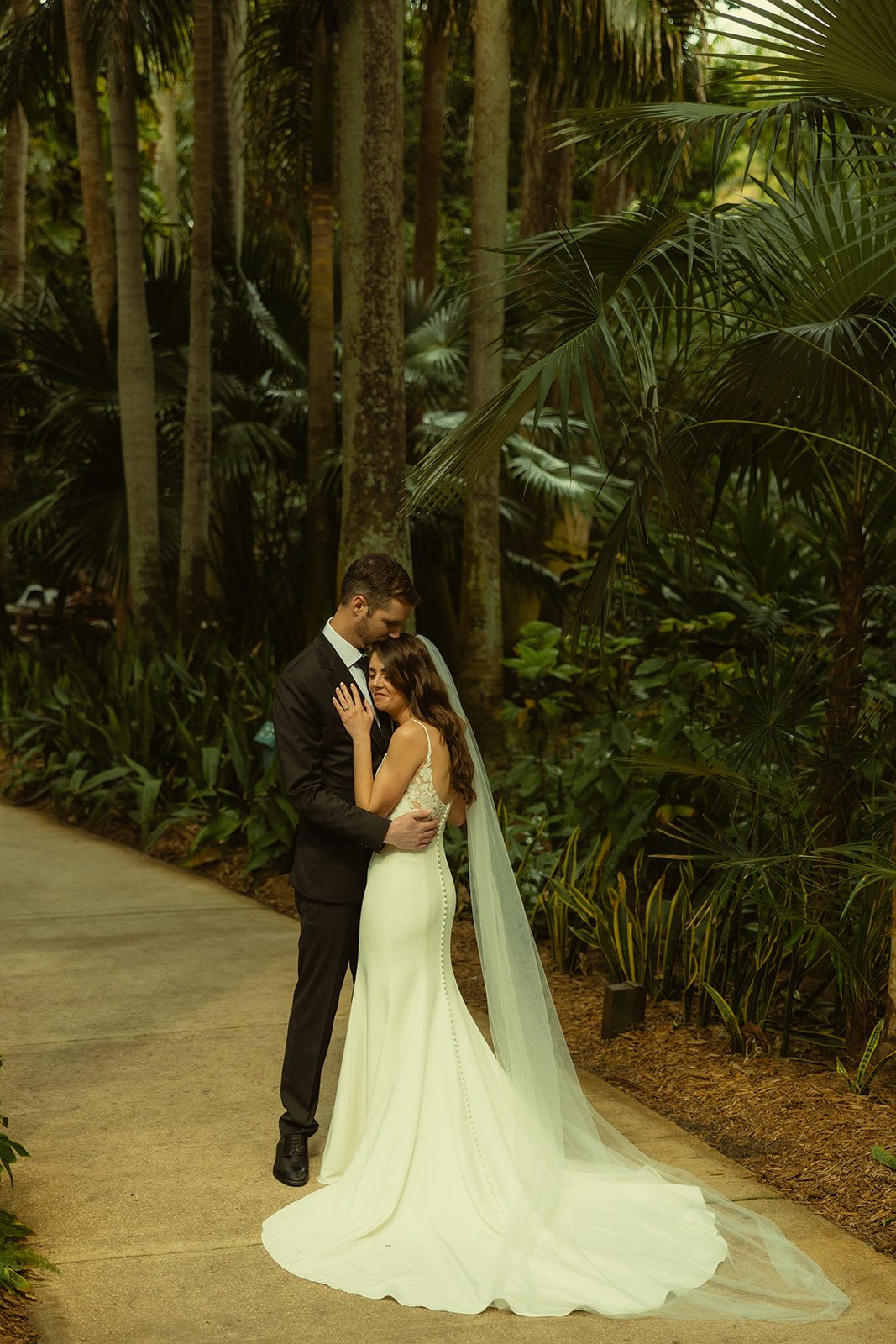 Hugging Bride and Groom Wedding Couple Portrait in Sunken Garden Wedding