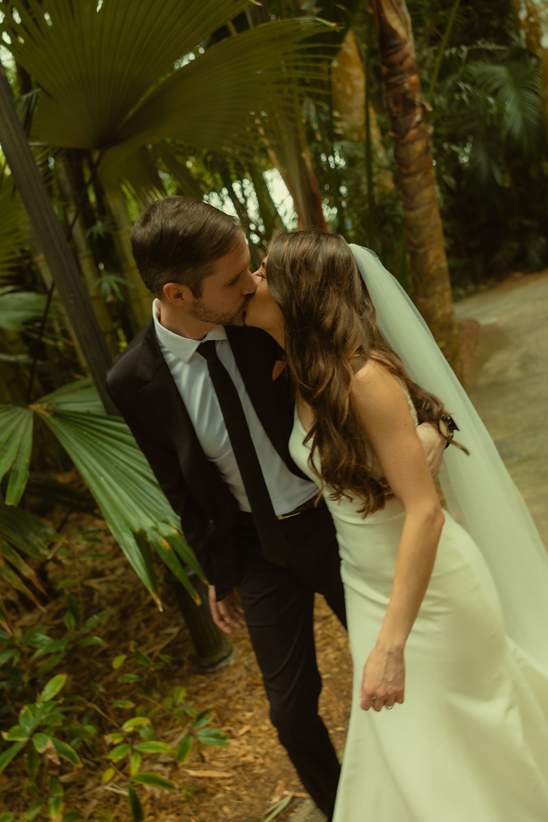 Bride & Groom Motion Blur Kissing Wedding Portrait in Sunken Gardens St Petersburg