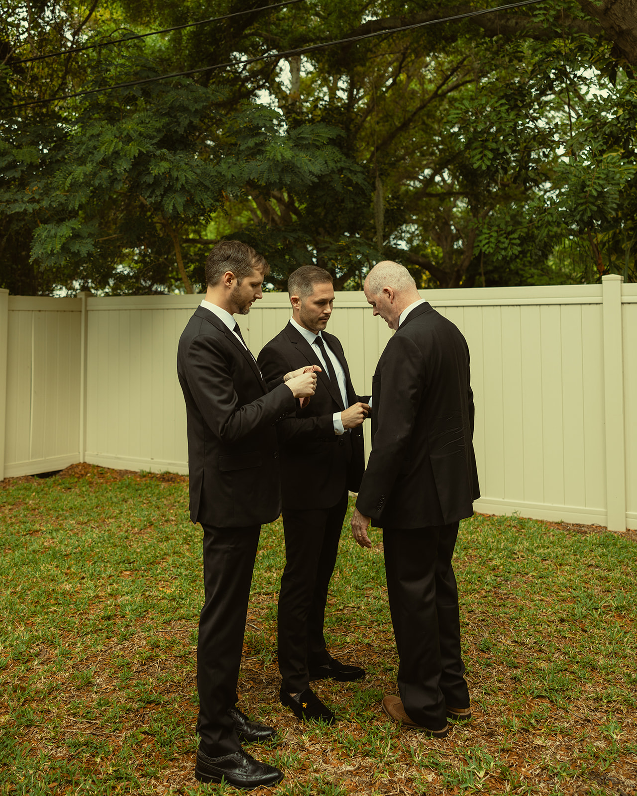 Intimate Getting Ready for Groom Candid Doing Tie with Dad and Best Man in St.Petersburg 

Aileen Ayala Photography 