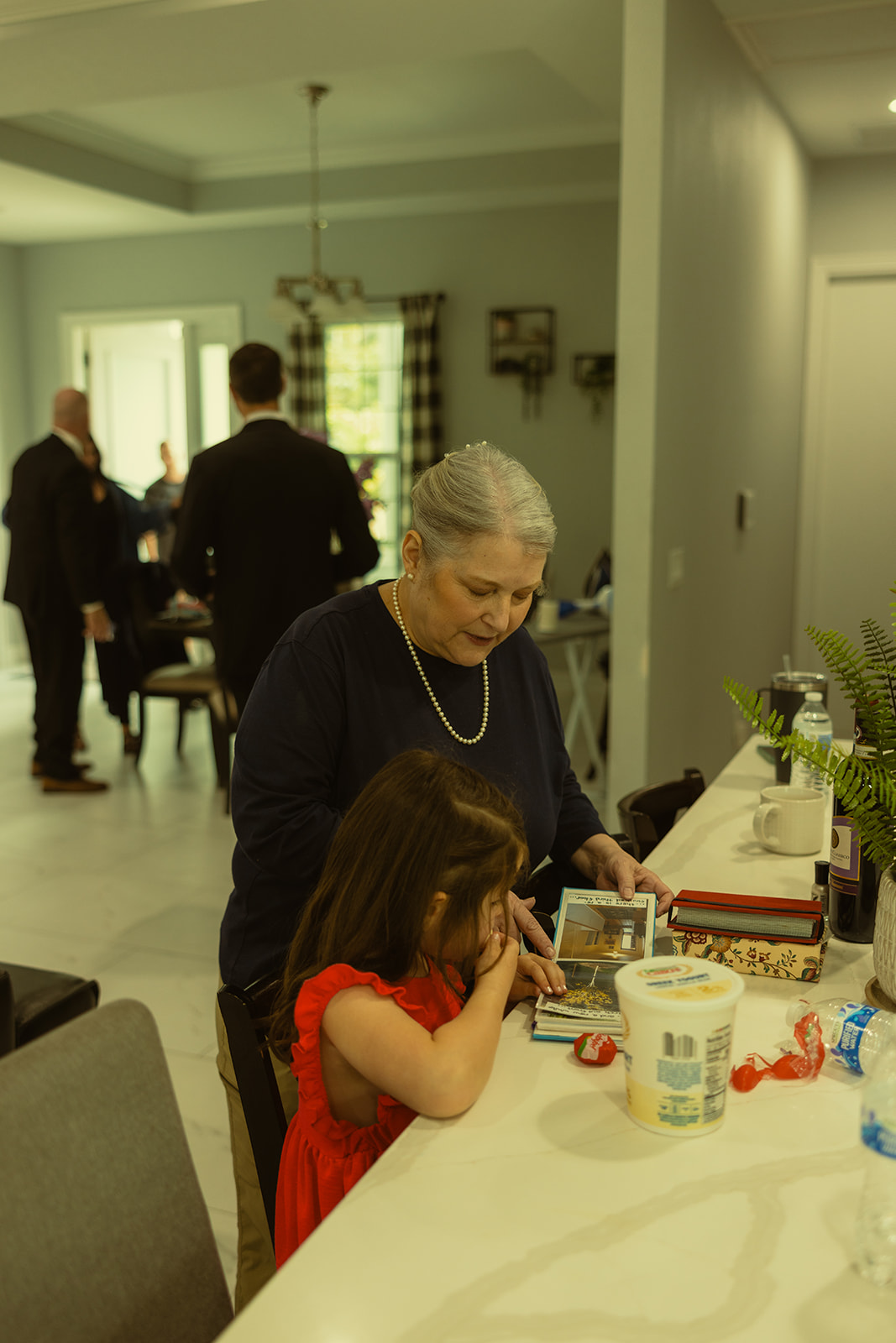 Candids of Groom Getting Ready for wedding in St.Petersburg by Aileen Ayala Photography. Mother of Groom and Flower Girl.